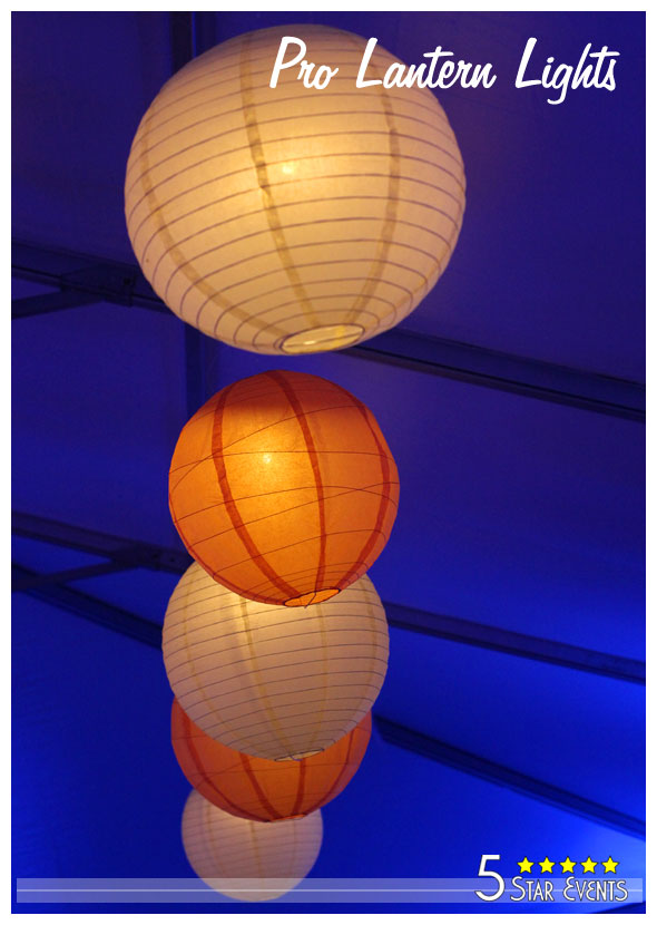 Paper hanging lanterns with blue uplights